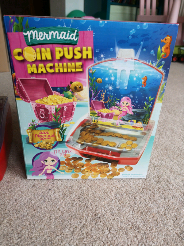 mermaid coin push machine